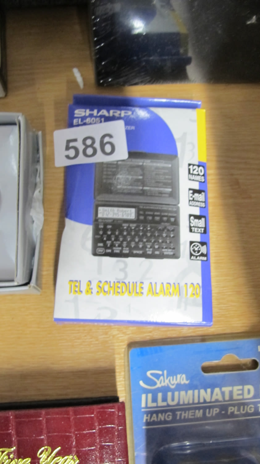 Lot 586: Retro Sharp EL 6051 electronic organiser
