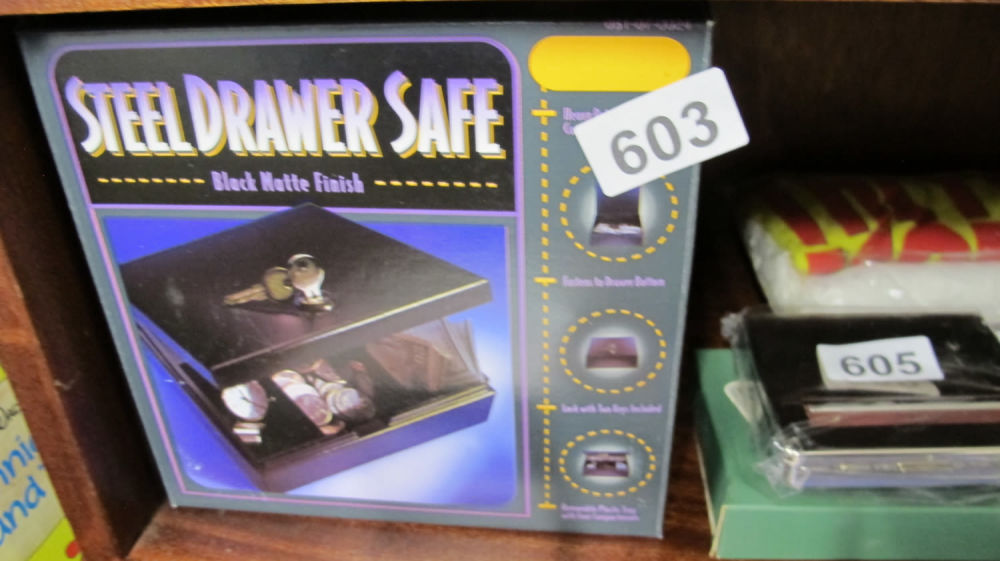 Lot 603: Boxed steel drawer safe/money box