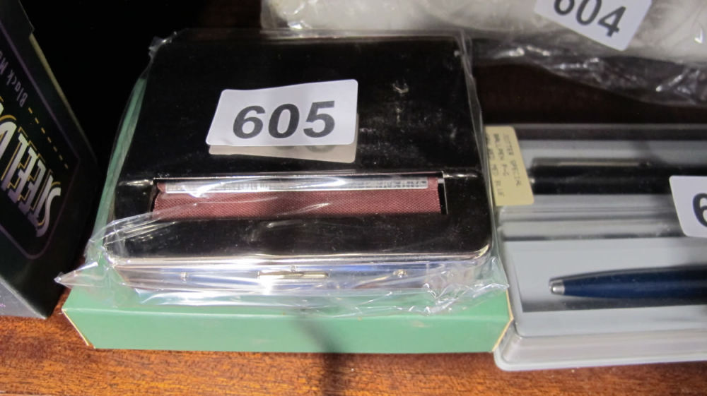 Lot 605: New tobacco tin ideal for rolling your own...