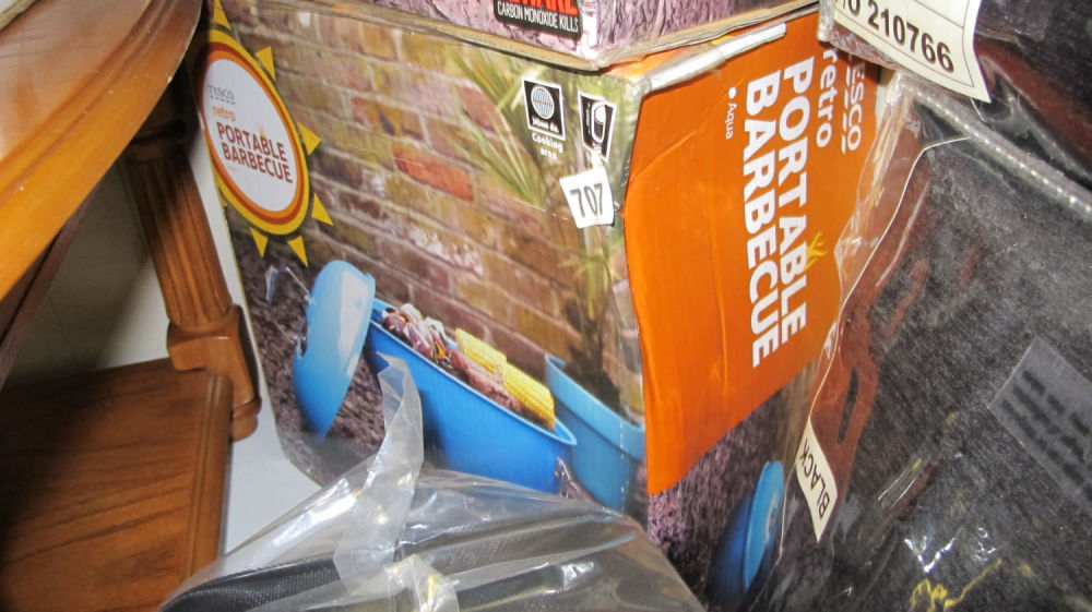 Lot 707: Retro portable barbecue. So if this was retro...