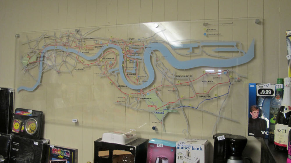 Lot 711: large perspex printed map of London train stations...