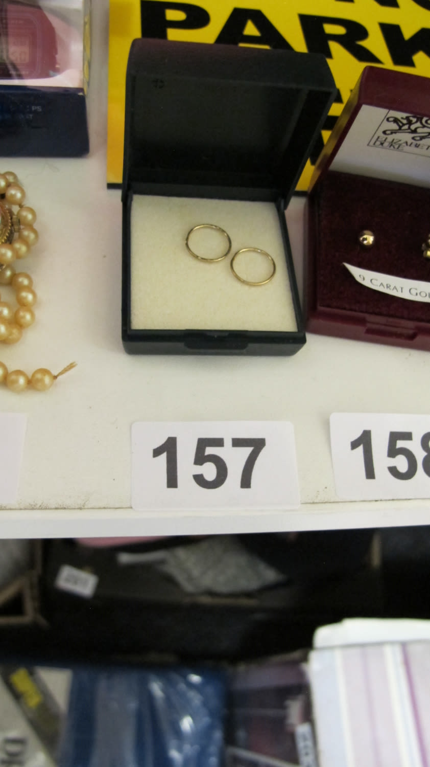 Lot 157: Gold sleeper earrings