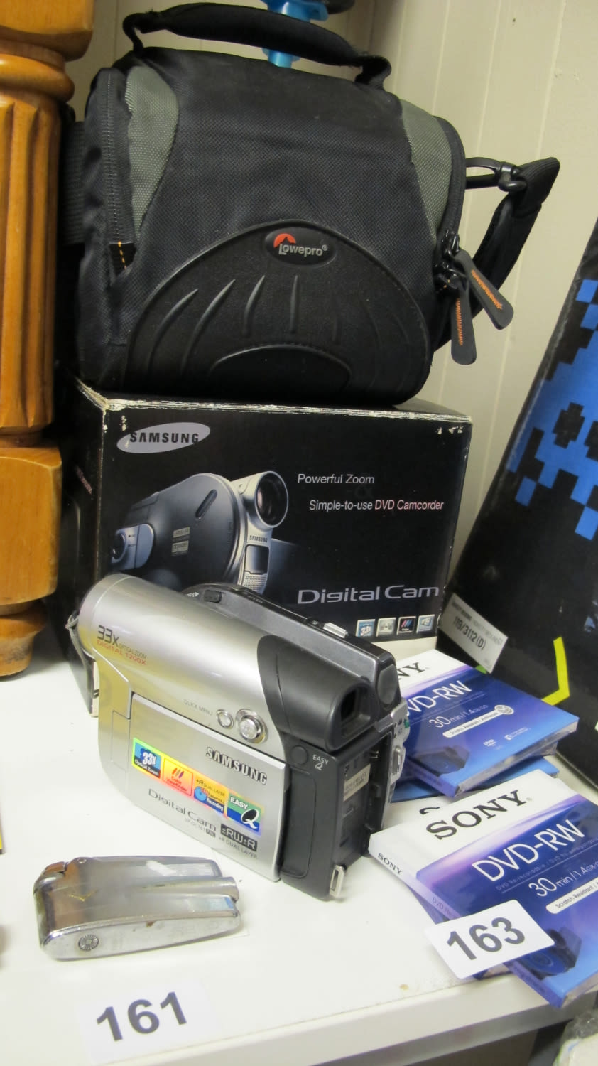 Lot 163: Samsung VP DC161 DVD camcorder with spare new...