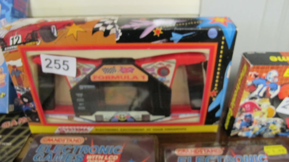 Lot 255: Vintage Systema Formula 1 Handheld electronic game