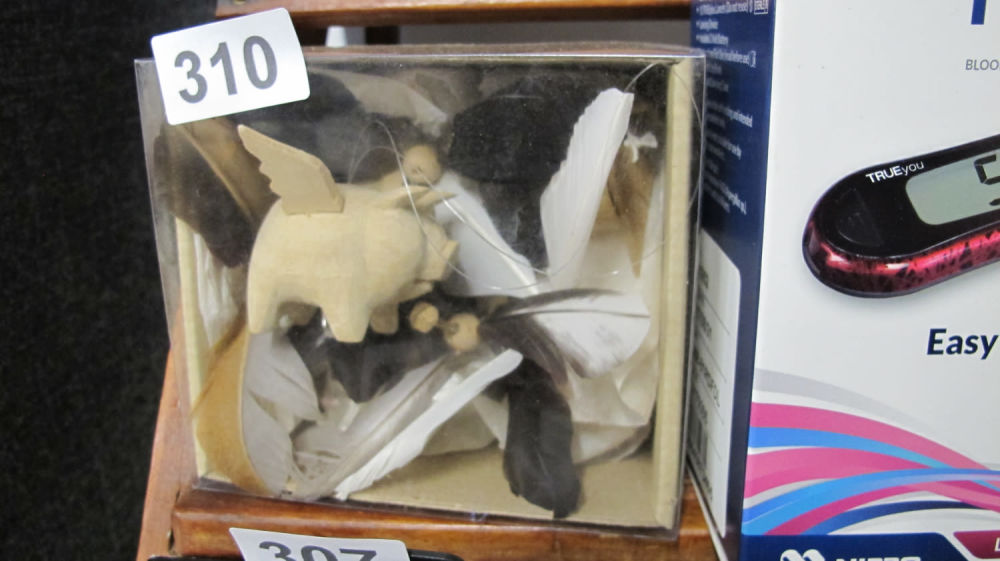 Lot 310: Flying pigs