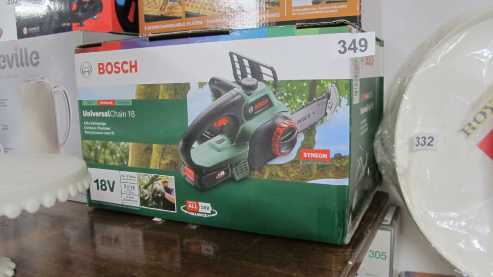 Lot 349: BOSCH ‎3600HB8000 CORDLESS CHAINSAW UNIVERSAL CHAIN 18 BRAND...