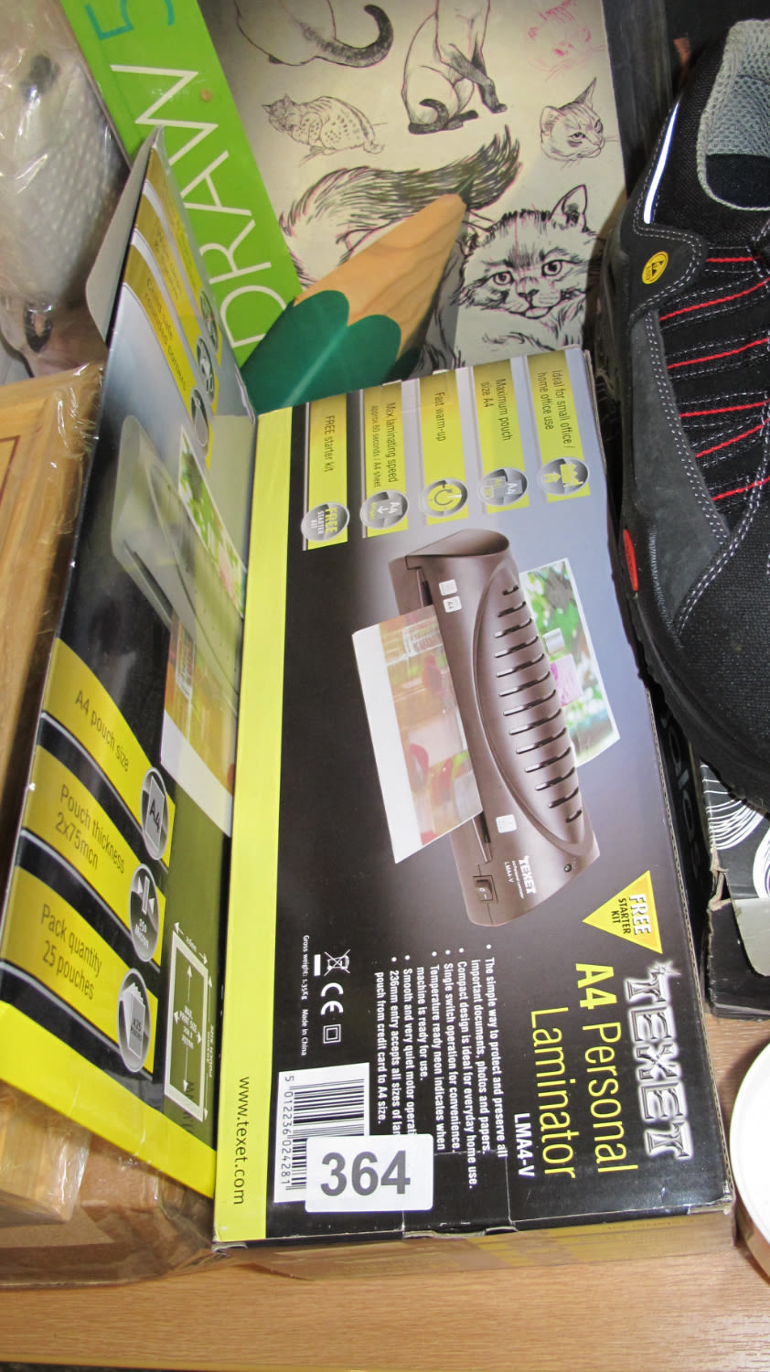 Lot 364: A4 laminator machine and laminating sleeves
