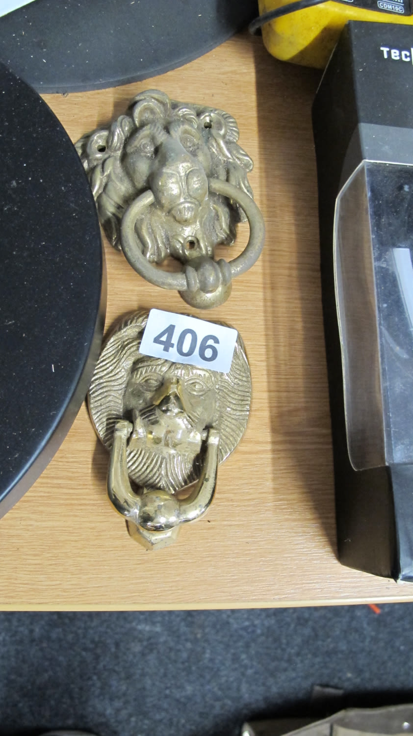 Lot 406: 2 lion door knockers