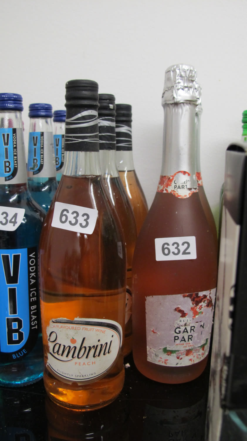 Lot 633: Bottles of peach Lambrini