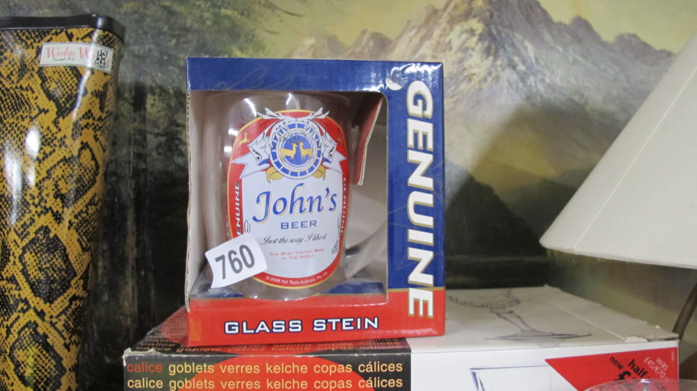 Lot 760: Glass stein for John.