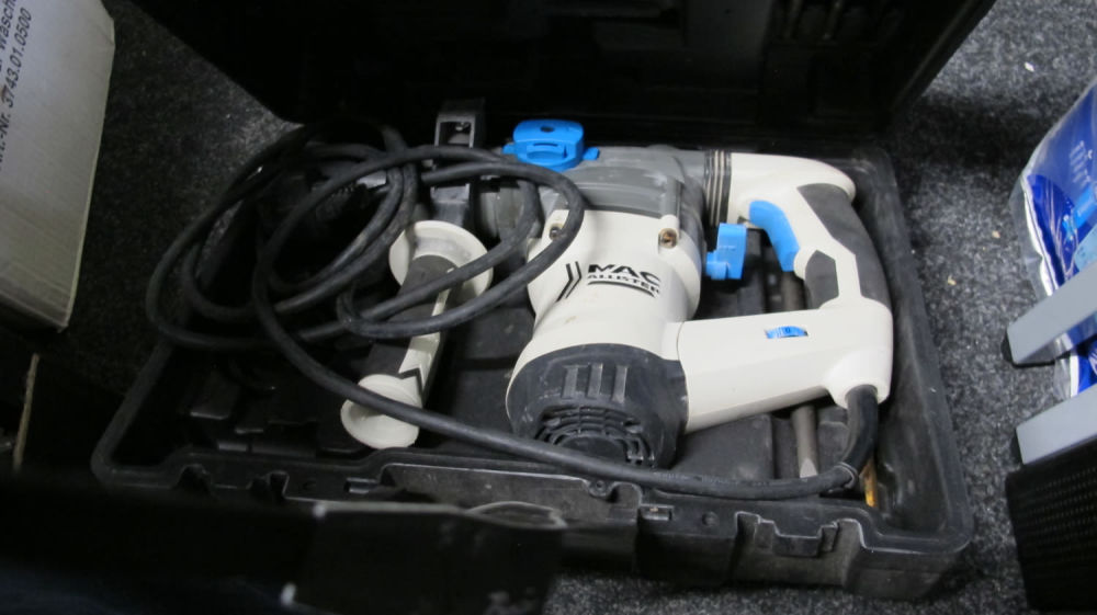 Lot 989: a mcallister SDS drill for spares and repairs