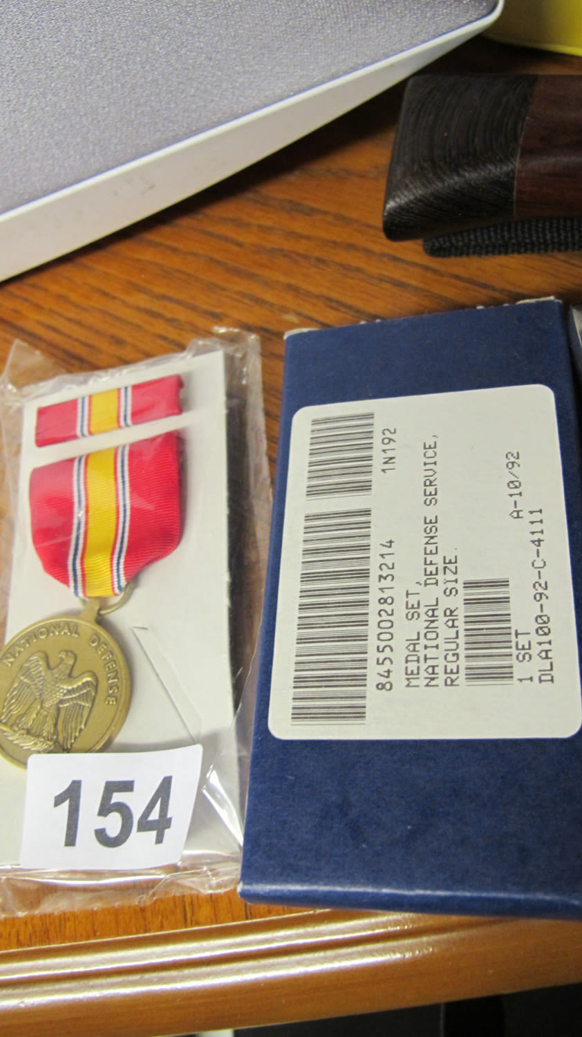 Lot 154: USA National Defence service metal regular size with...