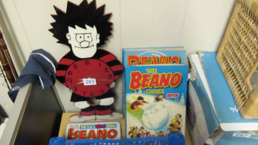 Lot 203: Beano annuals and wooden hand made clock