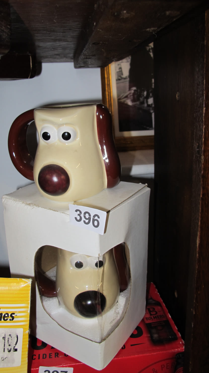 Lot 396: 2 Grommit mugs