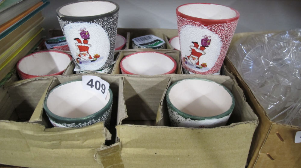 Lot 409: Christmas themed plant pots
