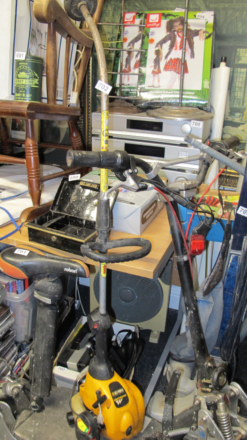 Lot 702: Petrol strimmer