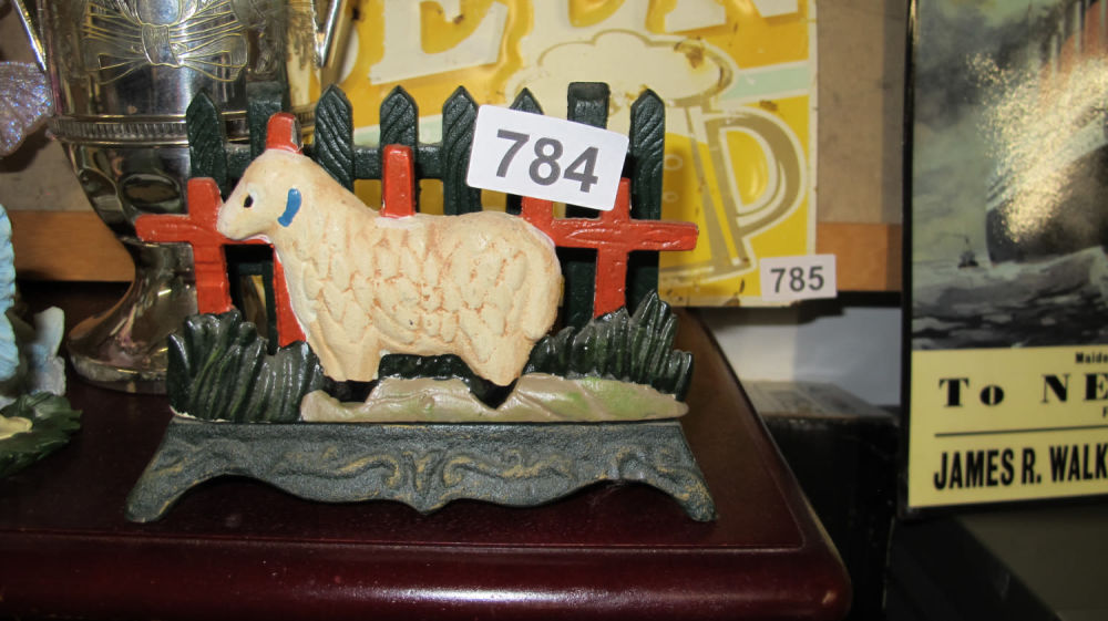 Lot 784: Sheep themed door stop