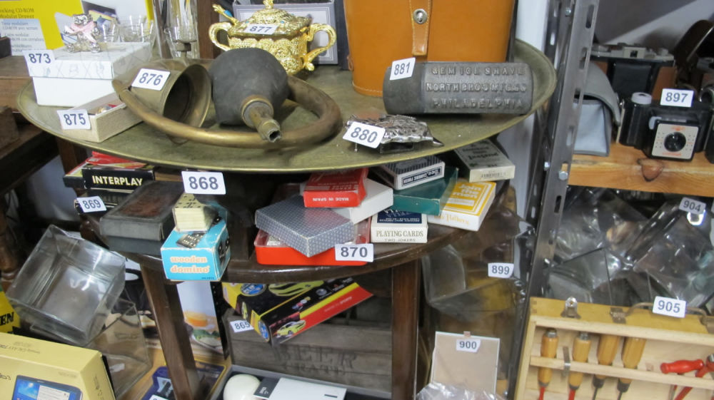 Lot 868: Brass topped table