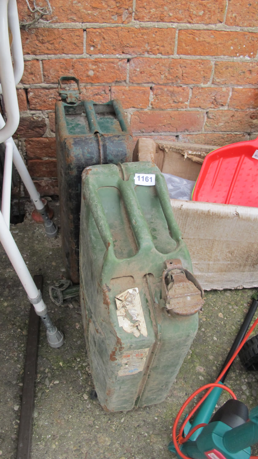 Lot 1161: two jerry cans and one nozzle