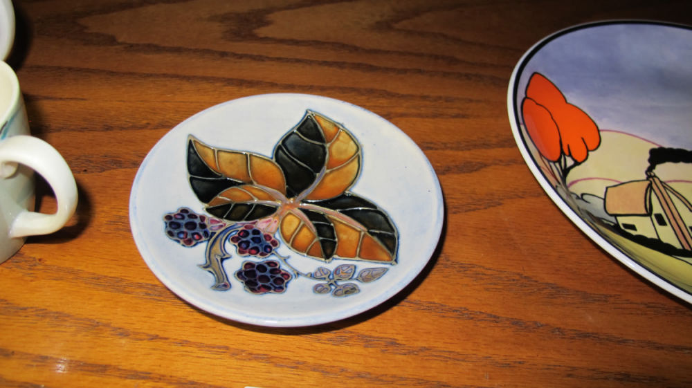 Lot 180: Moorcroft Bramble pattern pin dish
