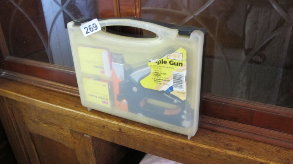 Lot 269: Cased staple gun set
