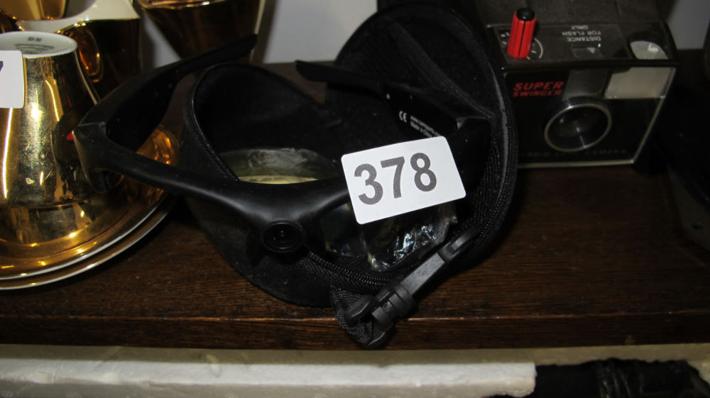Lot 378: Cyclist/Spy sunglasses with built in camera recorder with...