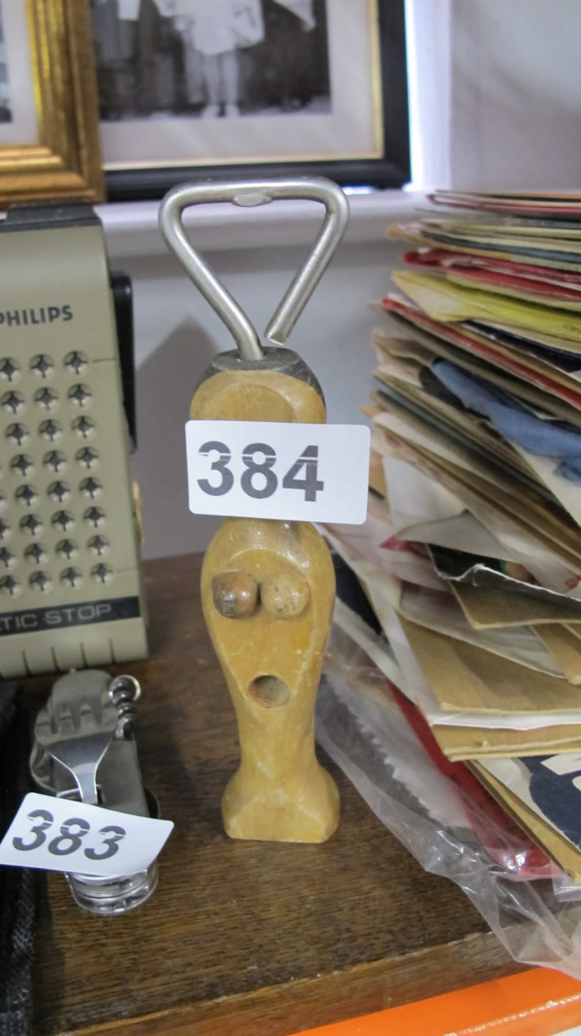 Lot 384: Weird bottle opener with boobs