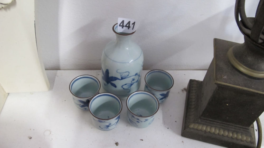 Lot 441: Japanese Sake set, signed to base
