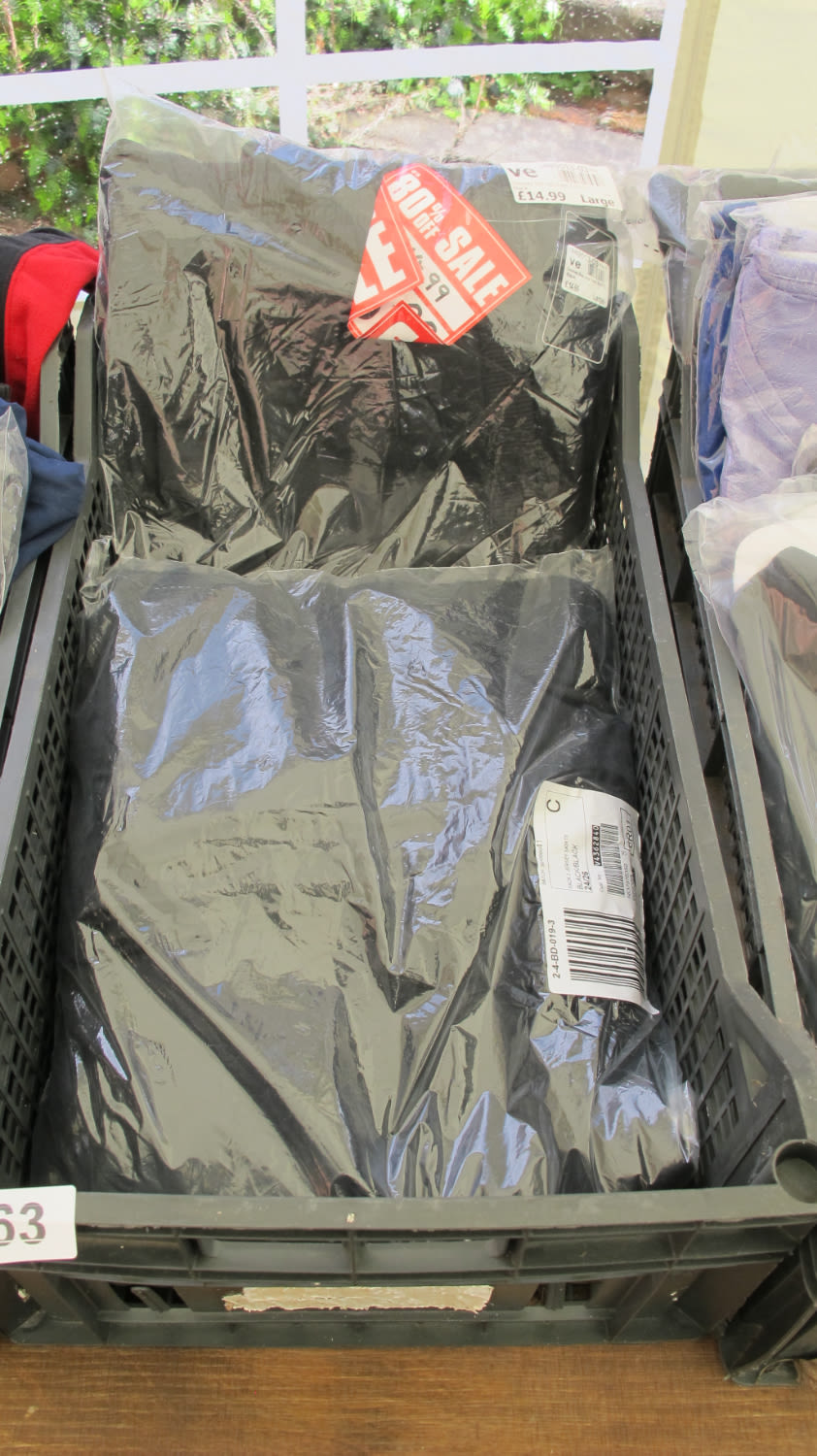 Lot 563: New clothing items