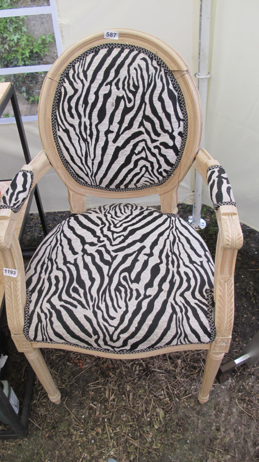 Lot 587: Zebra upholstered chair