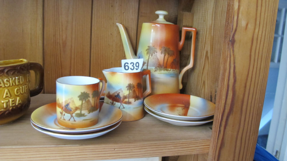 Lot 639: Part tea set.