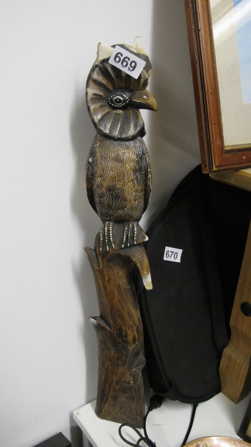 Lot 669: Wooden bird ornament