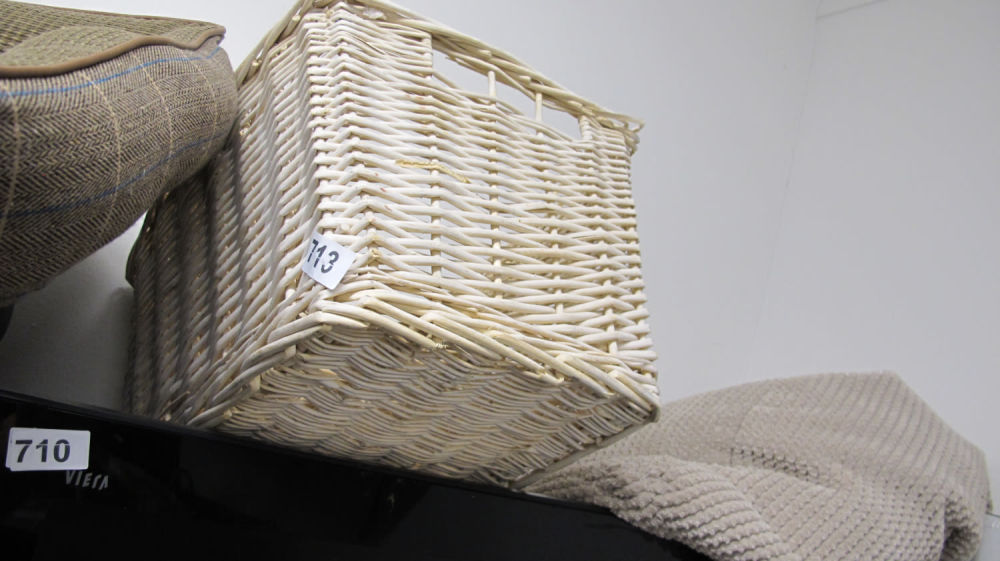 Lot 713: A white wicker basket
