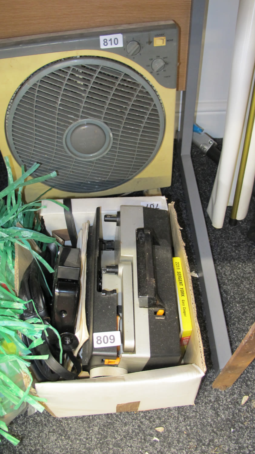 Lot 809: Vintage projector and films