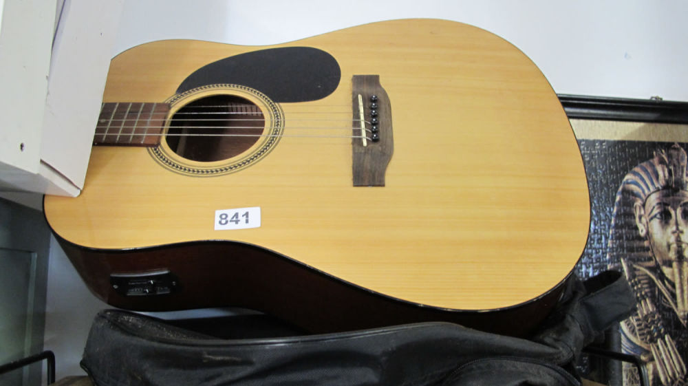 Lot 841: An electro-acoustic guitar