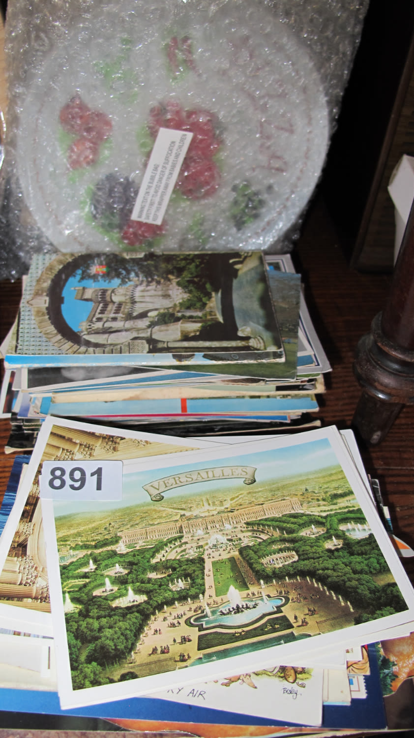 Lot 891: A quantity of postcards