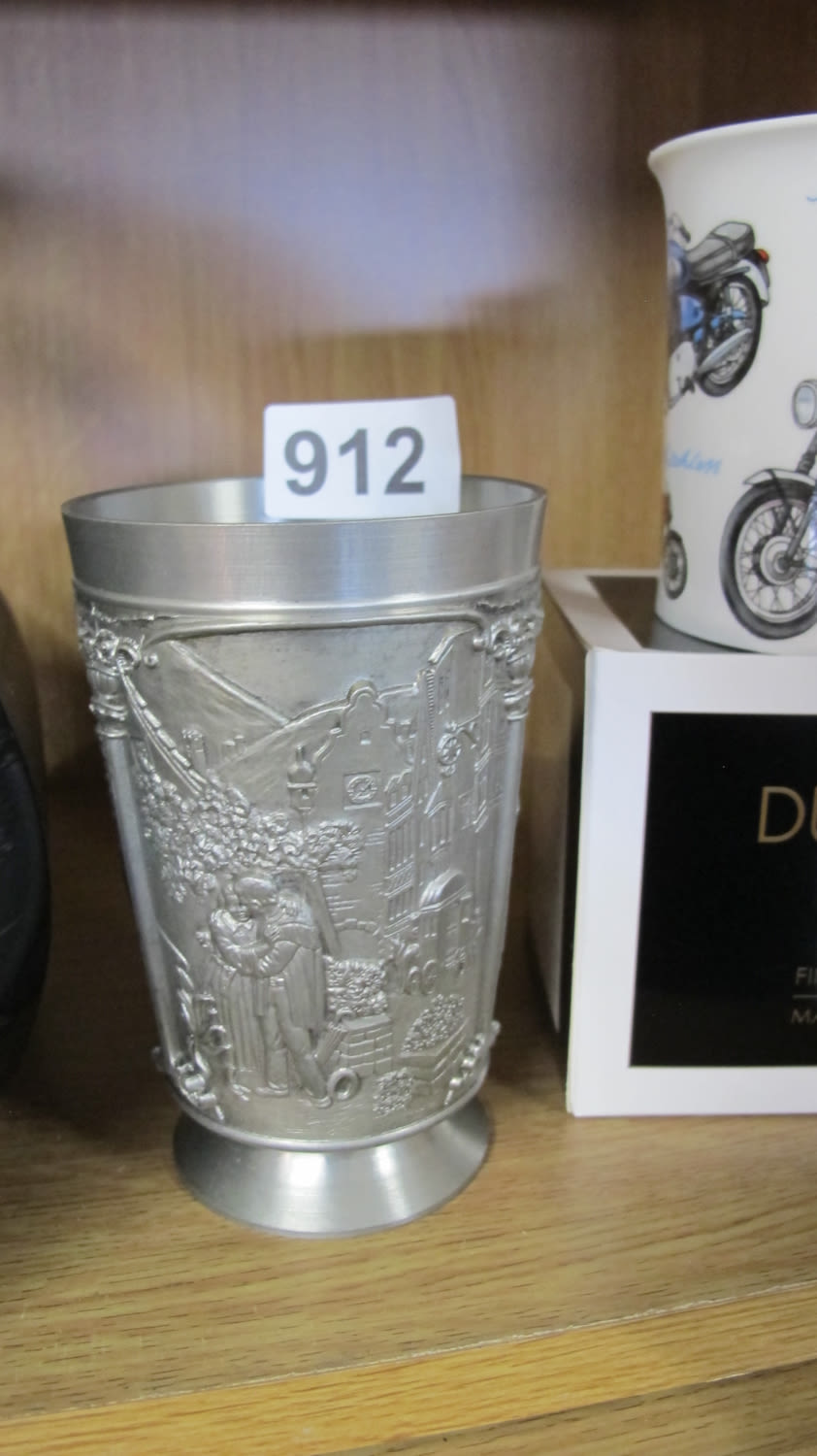 Lot 912: Pewter drinking cup