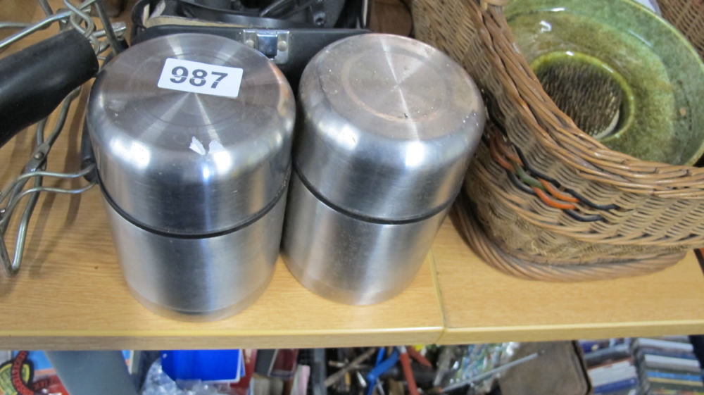 Lot 987: 2 Metal storage flasks