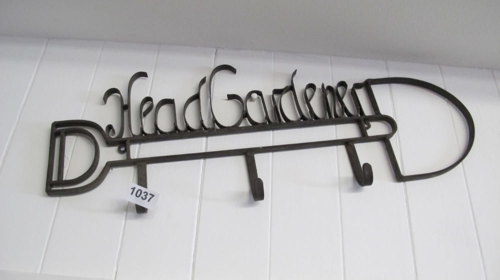 Lot 1037: head gardener metal wall sign