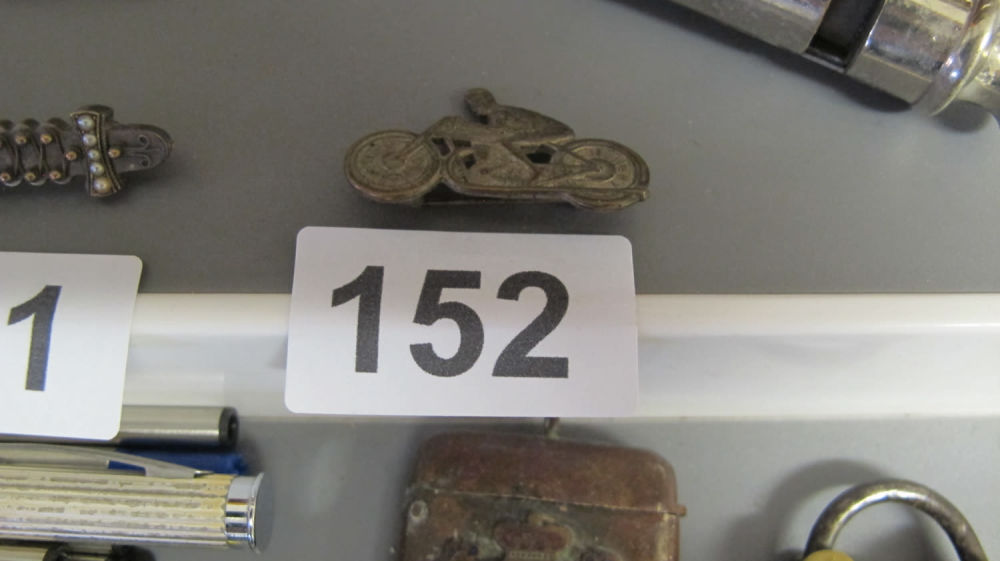 Lot 152: Motocyclist brooch