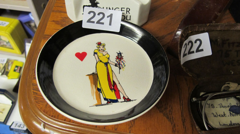 Lot 221: Wade ashtray depicting a beautiful lady with a...