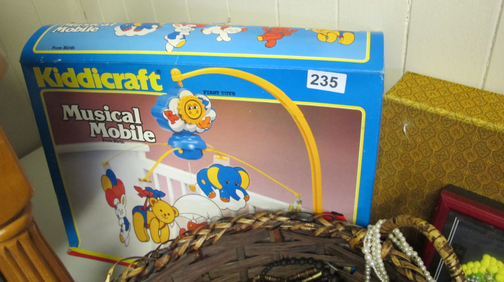 Lot 235: Vintage Kiddicraft musical cot mobile