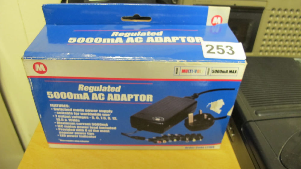 Lot 253: multi voltage AC adaptor