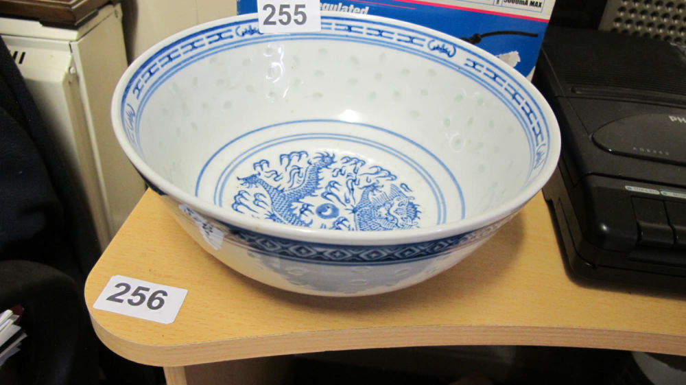 Lot 255: Early 20th Century large Jingdezhen rice pattern bowl...