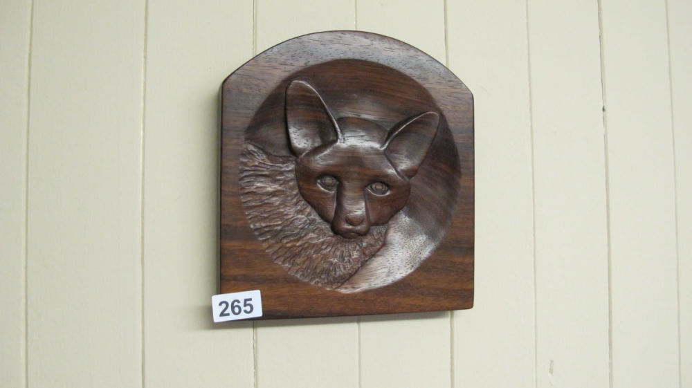 Lot 265: Wooden carved fox plaque