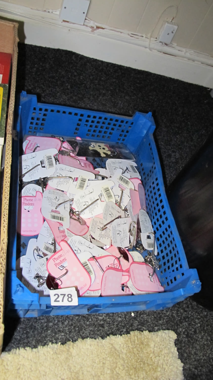 Lot 278: Box of phone finders and charms