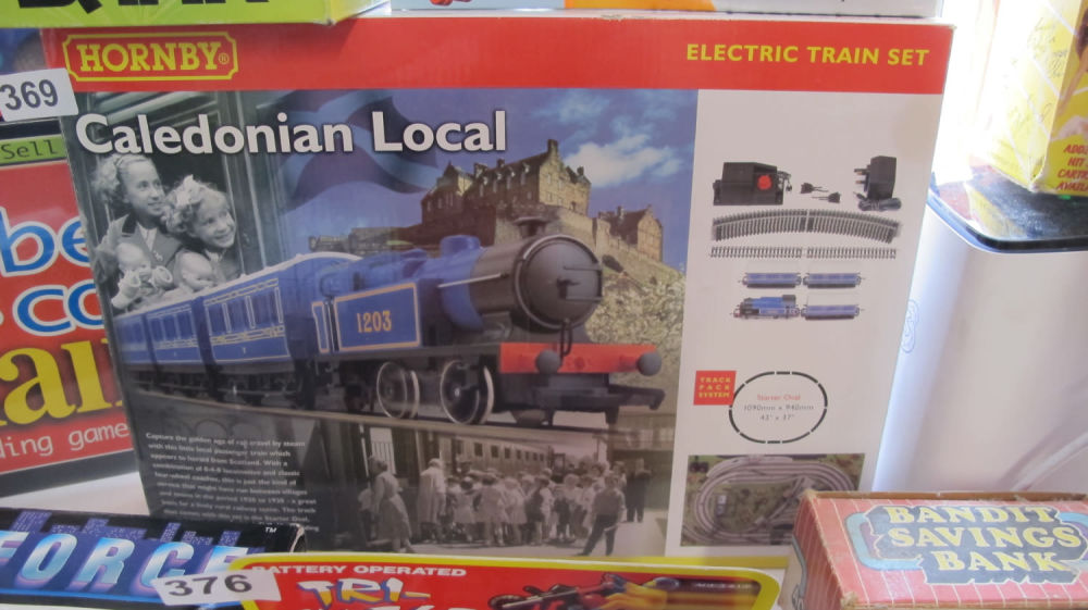 Lot 369: Brand new old stock Hornby Caledonian Local electric...