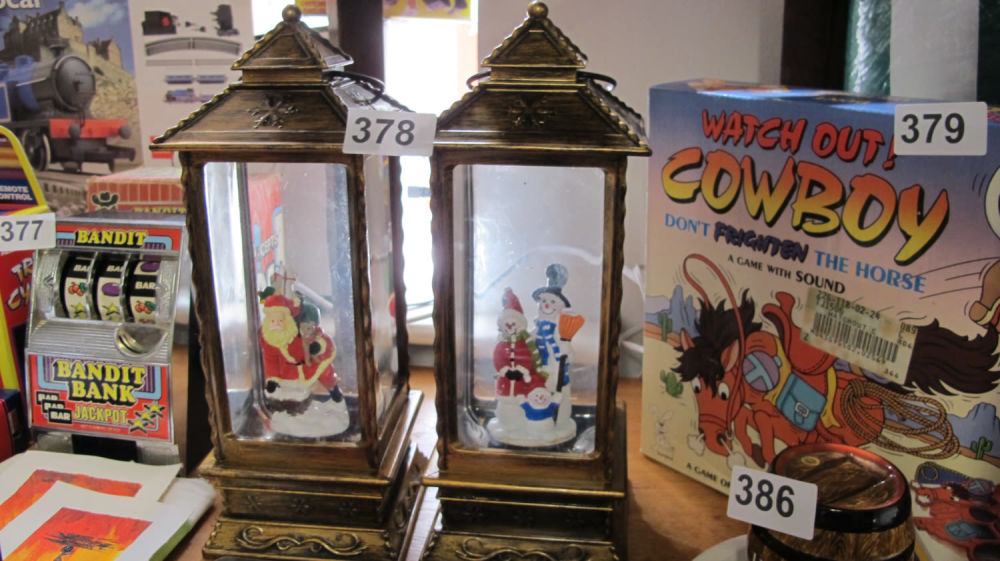 Lot 378: 2 Christmas lantern ornaments snowglobes