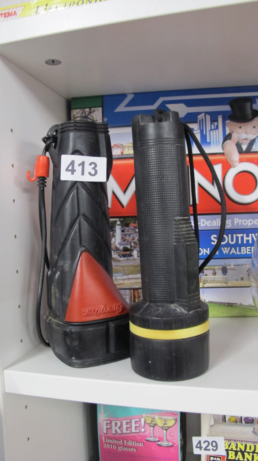 Lot 413: 2 torches, one for each hand