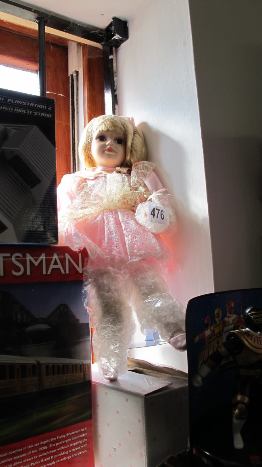 Lot 476: Brand new old stock creepy doll